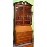 A Georgian style mahogany inlaid bureau bookcase, 108cm wide Reasonable condition however some