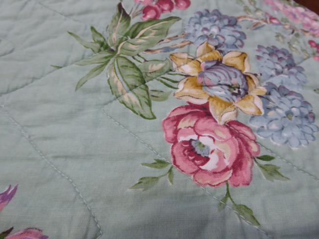 A 20th century floral printed cotton quilt, decorated with pink roses, 220cm by 200cm; and another - Image 8 of 8