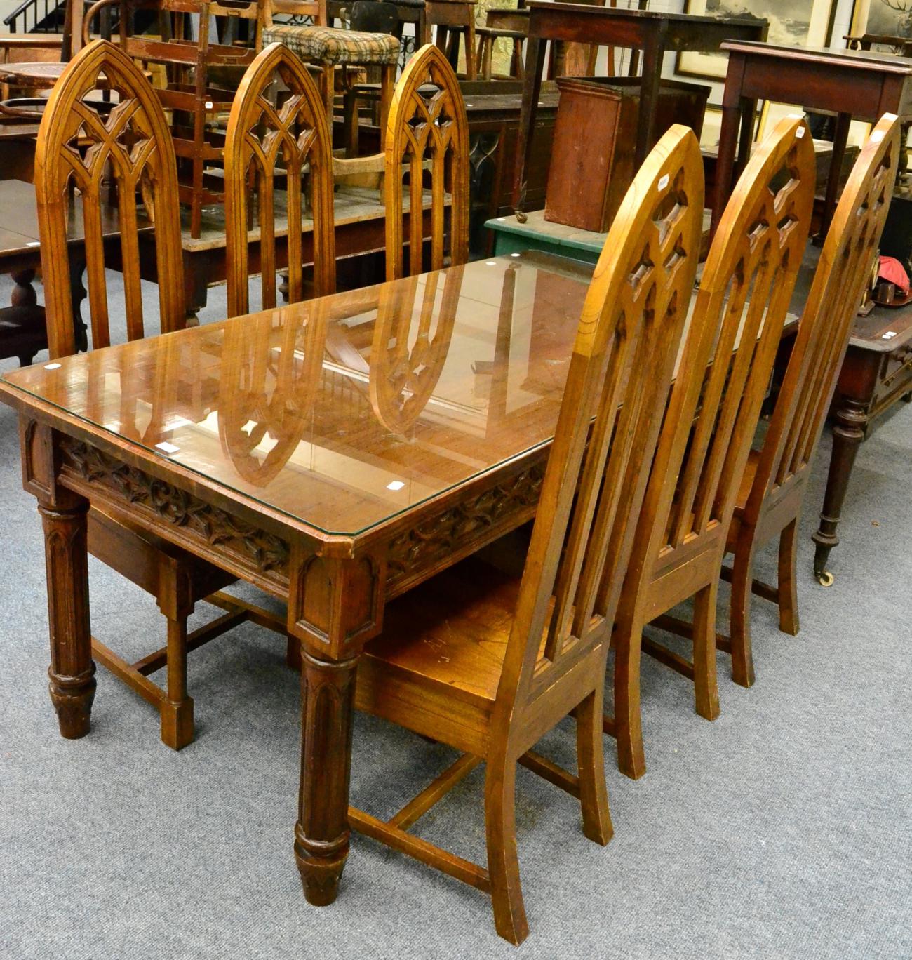 A Gothic table and six chairs