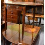 An early 19th century cross banded mahogany Pembroke table