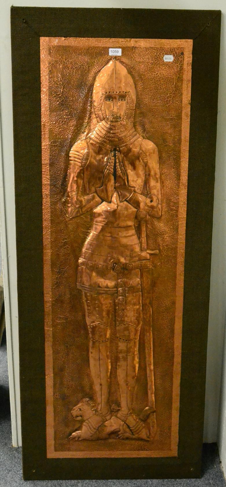 A large copper rubbing of a knight