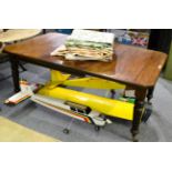 A late Victorian mahogany extending dining table