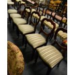 A set of six Victorian balloon back dining chairs