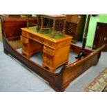 A mahogany framed sleigh bed