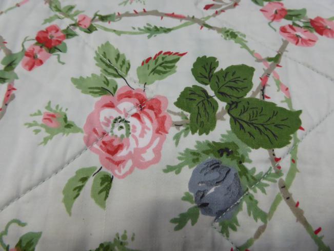 A 20th century floral printed cotton quilt, decorated with pink roses, 220cm by 200cm; and another - Image 5 of 8