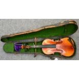 A cased violin for restoration