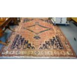 A West Iranian village carpet, the field with central stepped medallion framed by spandrels and