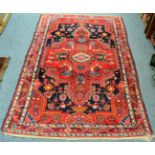 Hamadan rug, Iranian Kurdistan, the indigo field centred by a stepped medallion framed by