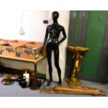 Two BR thress aspect hand lamps and a road maintenance lamp, a modern female shop mannequin, a