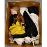 An Armand Marseille 390 bisque socket head doll, and a quantity of clothes and accessories,