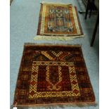 An Afghan Prayer rug, the chestnut field with rams' horn motif Mihrab enclosed by borders of