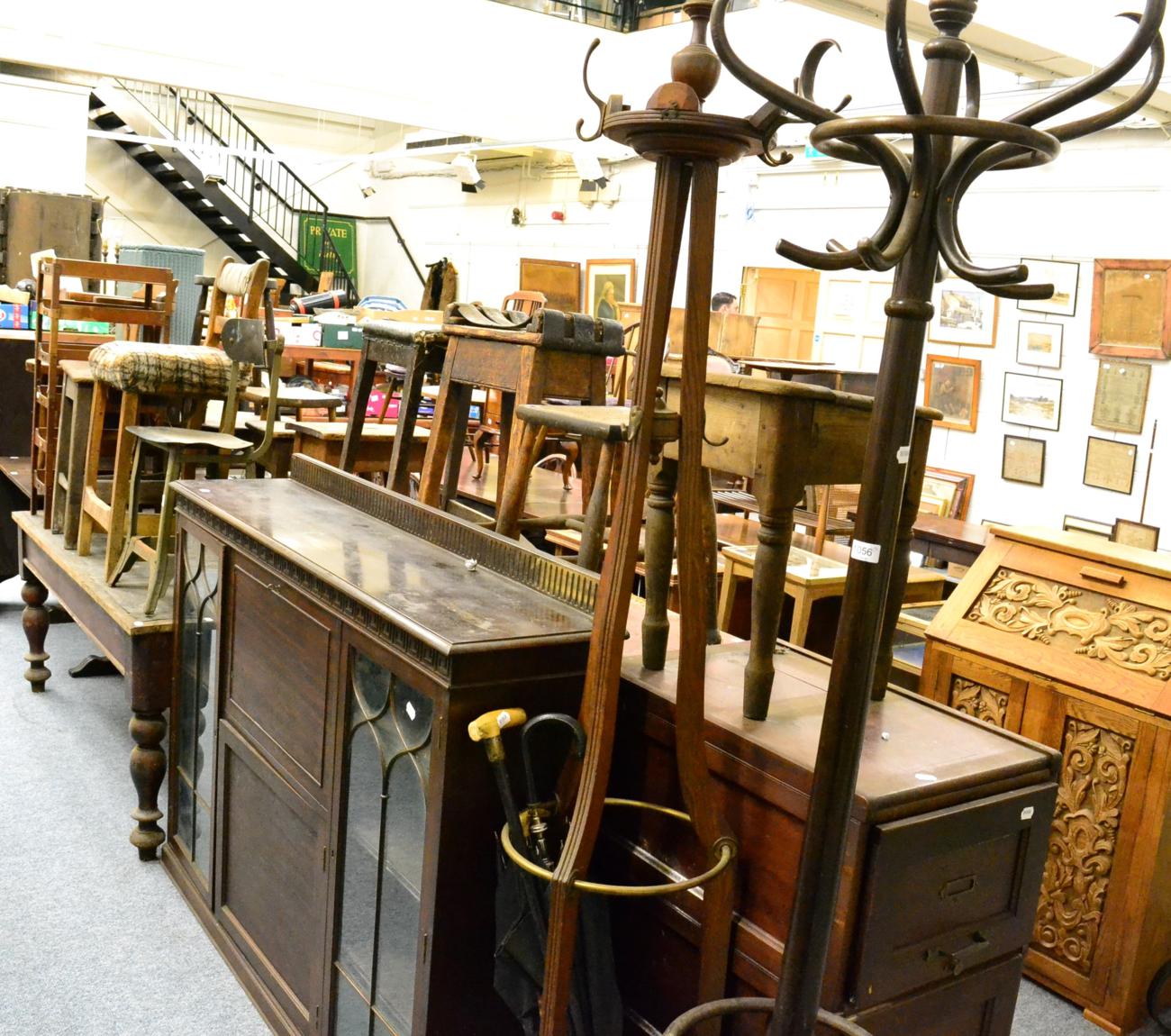 ~ Eight late 19th century pine stools, two hat stands, letter rack, small oak coffee table,