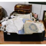 Quantity of white linen, lace etc (in two boxes) with a leather bag
