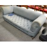 A Victorian Chesterfield sofa upholstered in blue, labelled ''Sopwith & Co Newcastle Upon Tyne''