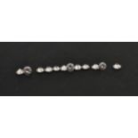 Twelve Loose Round Brilliant Cut Diamonds, estimated diamond weights 0.12 carat - 0.17 carat