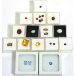 A Quantity of Loose Gemstones, including two opals, a round cut aquamarine, two baguette cut