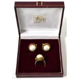 A pair of mabe pearl and ruby earrings and a matching ring, stamped '750', finger size O17.26g