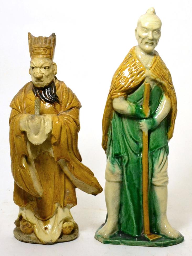 A Chinese pottery statue of a Daoist sage, 19th century, and a Chinese sancai pottery figure of a