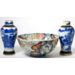 A pair of late 19th century Chinese provisional blue and white crackle ware vases decorated with