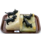 Pair of cold painted bronze terriers mounted on alabaster bookends, together with a similar pair (