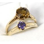 A 9ct gold citrine ring and a 9ct gold tanzanite ring Citrine ring - finger size S, 2.6g gross.