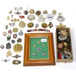 A quantity of assorted cap badges, regimental buttons, WW1 silk handkerchief etc