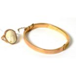 A 9ct gold cameo ring and a 9ct gold bangle Finger size M, 13.47g gross