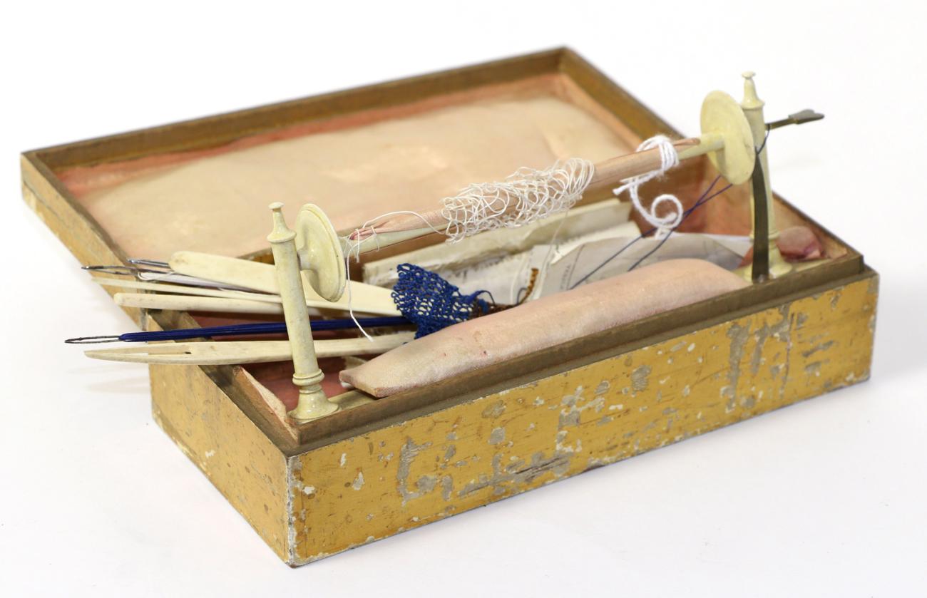Early 19th century Tunbridgeware bobbin winder, in a rectangular hinged box, enclosing a fitted