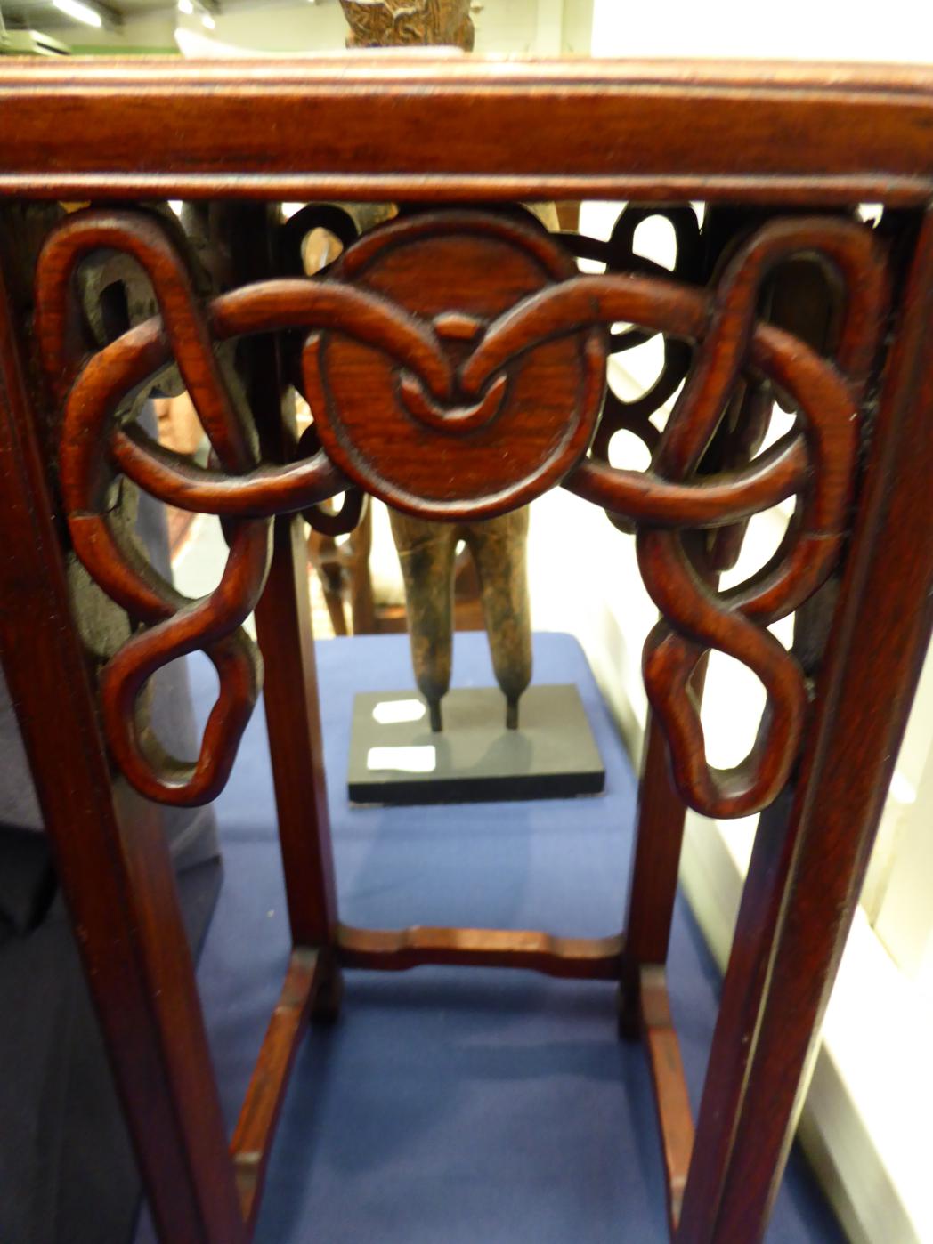 A small Chinese hardwood pot stand, 19th century, and another low hardwood stand - Image 4 of 5