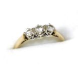 A 9ct gold three stone diamond ringFinger size K, 1.85g gross