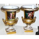 Pair of 19th century Paris painted campana urns with gilt decoration 30cm high. Urn 1 - rubbing to