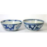 Two Chinese cracked- ice and prunus bowls Both in generally good condition