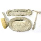 A silver candle snuffer, two dishes and a brush (4)6.7ozt
