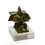 An Indian bronze modelled as a winged Buddha kneeling, raised on a modern grey marble base, height