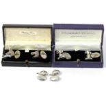 A pair of silver horse head cufflinks, a pair of jockey cap cufflinks and a pair of silver racing