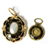 Two Victorian yellow metal and enamel mourning pendants, one mounted with a Mabe pearl (2)