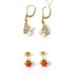 A pair of cultured pearl drop earrings, stamped '750' and a pair of coral stud earrings5.21g gross