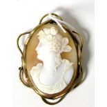 A Victorian cameo brooch in yellow metal mount