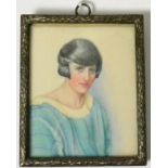 A portrait miniature on ivory titled 'Muriel' painted by Miss I Sutcliffe, label to verso, dated