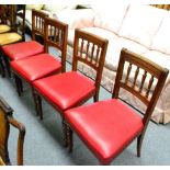 A set of four oak dining chairs