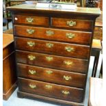 George III oak chest of drawers, two short over five long graduated