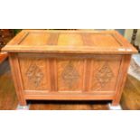 A reproduction oak small chest