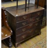 A George III small oak four height chest of drawers, on bracket feet