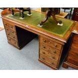 An early 20th century mahogany pedestal desk