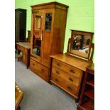 Arts & Crafts oak three piece bedroom suite comprising mirror fronted wardrobe with copper strap