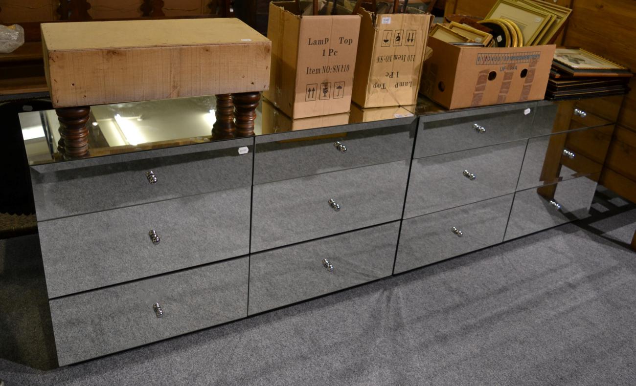 A pair of mirrored chests of drawers retailed by Next, together with a box stool in need of