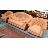 Buttoned hump back sofa with two matching armchairs