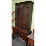 A 19th century mahogany glazed bookcase on stand