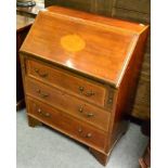 An Edwardian mahogany, satinwood banded and shell inlaid small bureau