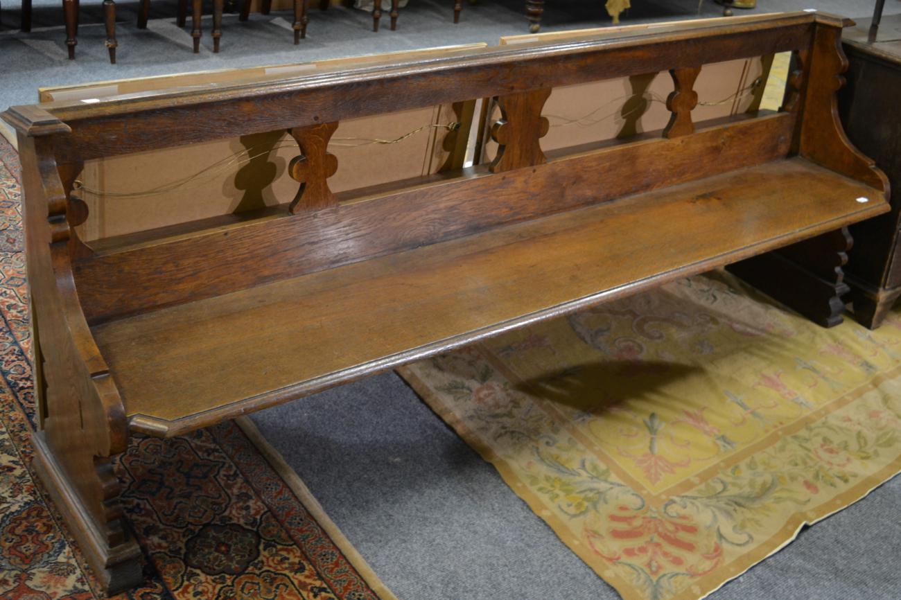 Sir George Gilbert Scott (1811-1878): A Gothic revival oak pew, 210cm long Installed in the